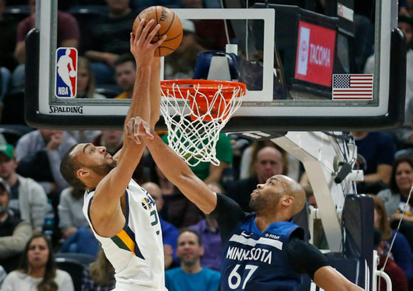 Wolves forward Taj Gibson defended Utah's Rudy Gobert in the first half Friday. Gibson was ejected in the third quarter.