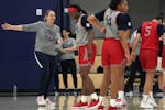 Cheryl Reeve, left, directed Team USA’s players during Tuesday’s practice at the Mayo Clinic courts in downtown Minneapolis.