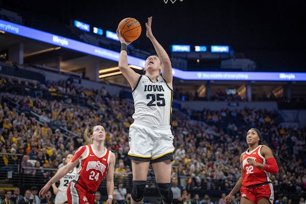 Iowa Hawkeyes' forward Monika Czinano (25) goes up for two during the second half of the Big Ten women's Championship basketball game on Sunday, March