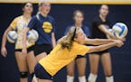 Prior Lake High School volleyball player CC McGraw digs the ball during a captain's practice. ] (Leila Navidi/Star Tribune) leila.navidi@startribune.c