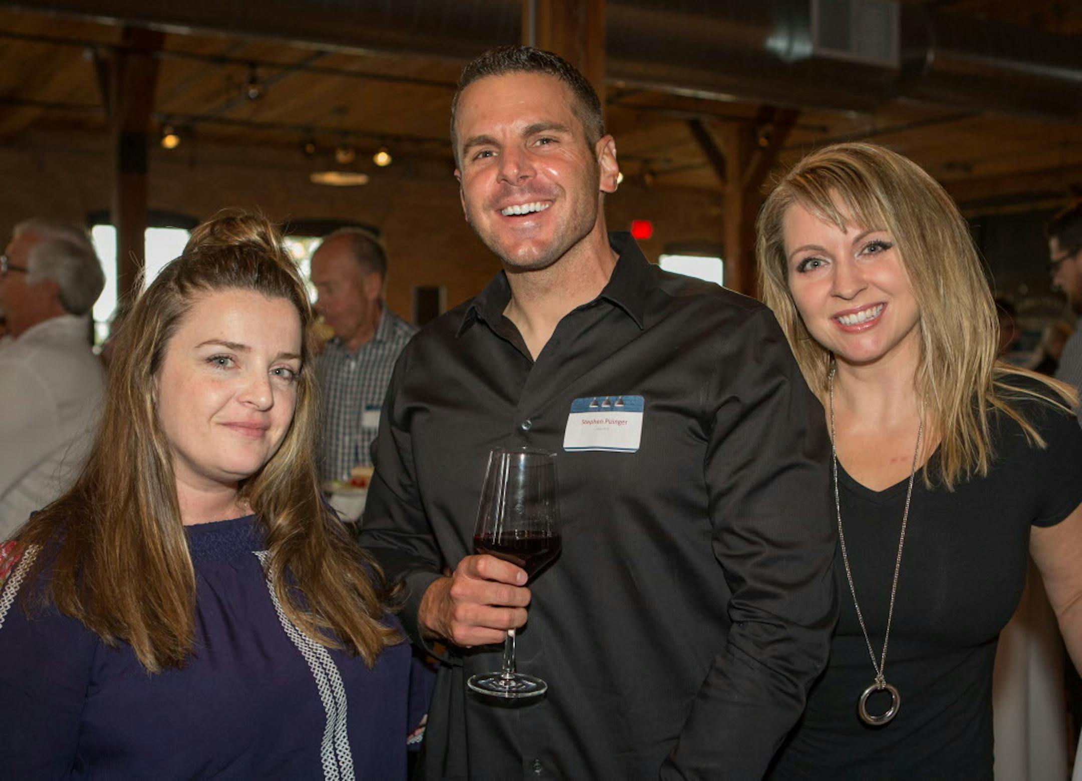 Heather Schultz with Stephen and Susie Pizinger.