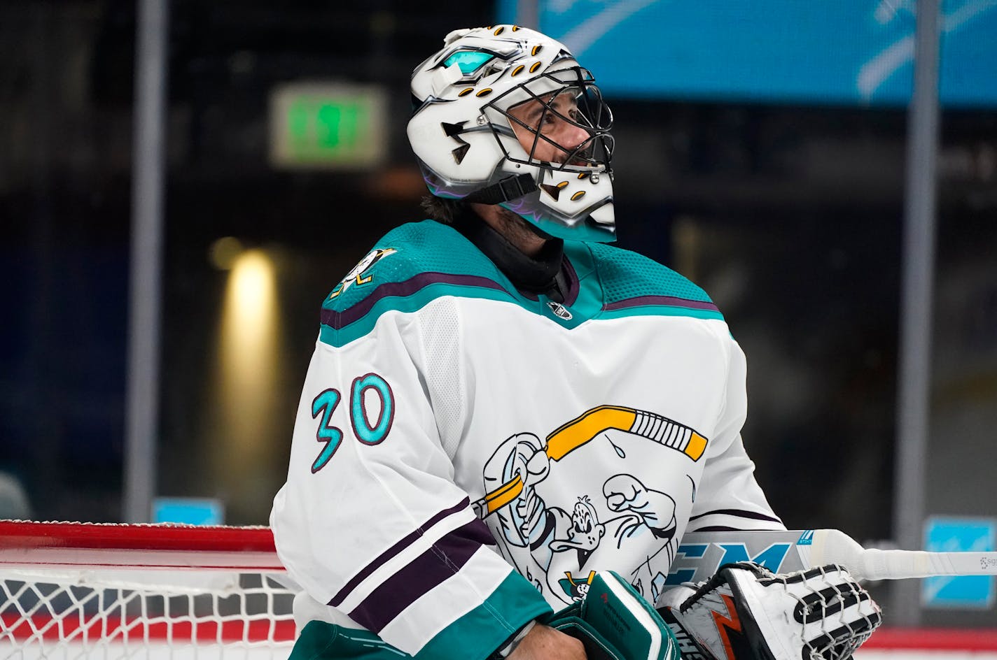 Anaheim Ducks goaltender Ryan Miller pauses after giving up a goal to Colorado Avalanche center Nazem Kadri during the first period of an NHL hockey game Tuesday, March 16, 2021, in Denver. (AP Photo/David Zalubowski)