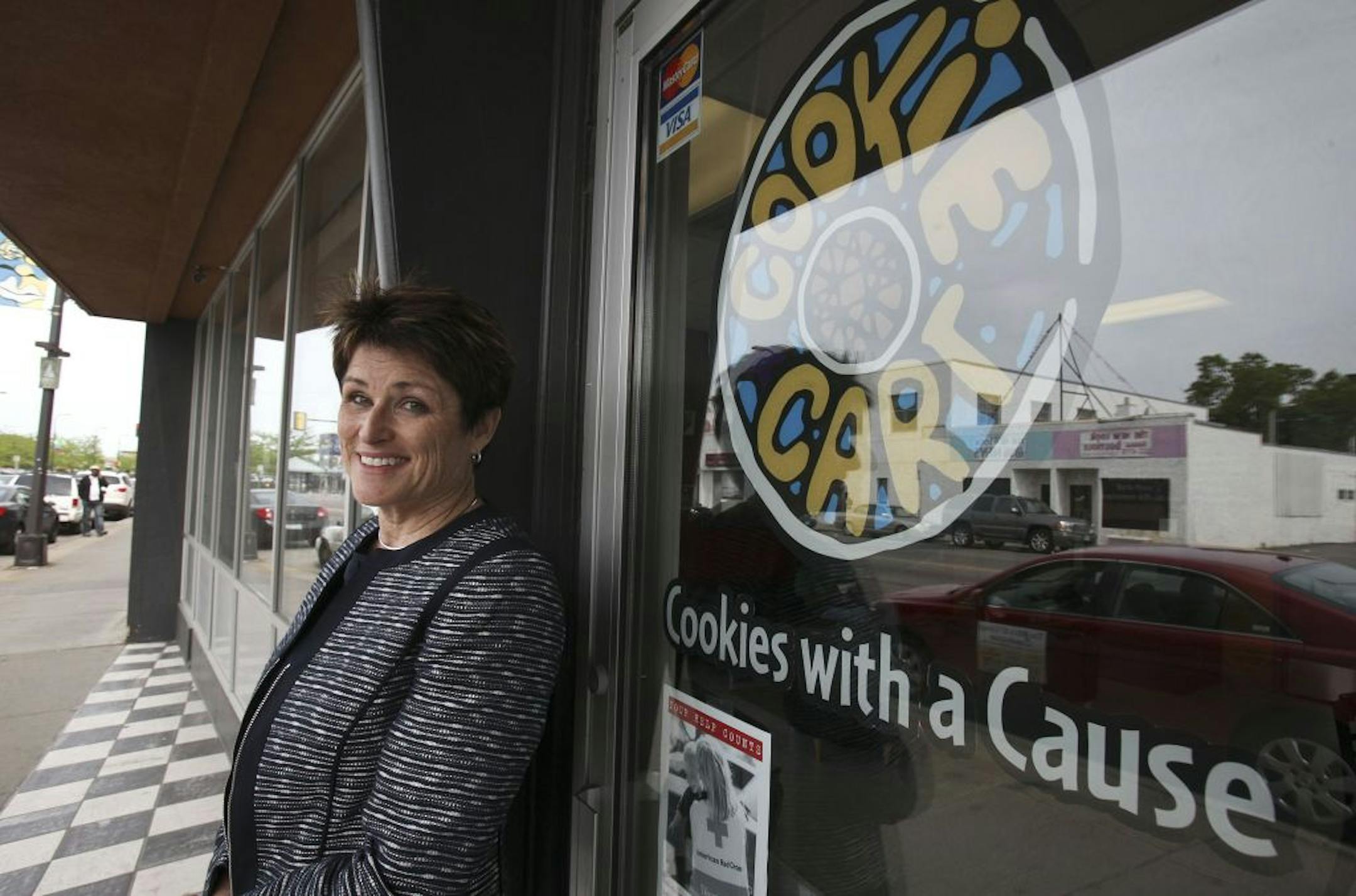 Sally Mainquist, CEO of Certes Financial Pros, stood outside the Cookie Cart in north Minneapolis. Her company has been using the cookies from this non-profit as anniversary and appreciation gifts to employees and clients.