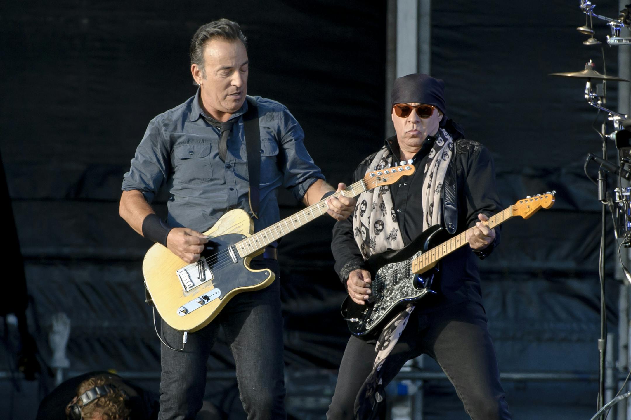 Bruce Springsteen and Stevie Van Zandt, right, perform at the Hard Rock Calling Festival in the Queen Elizabeth Olympic Park, London, Sunday, June 30, 2013. (Photo by Jonathan Short/Invision/AP)