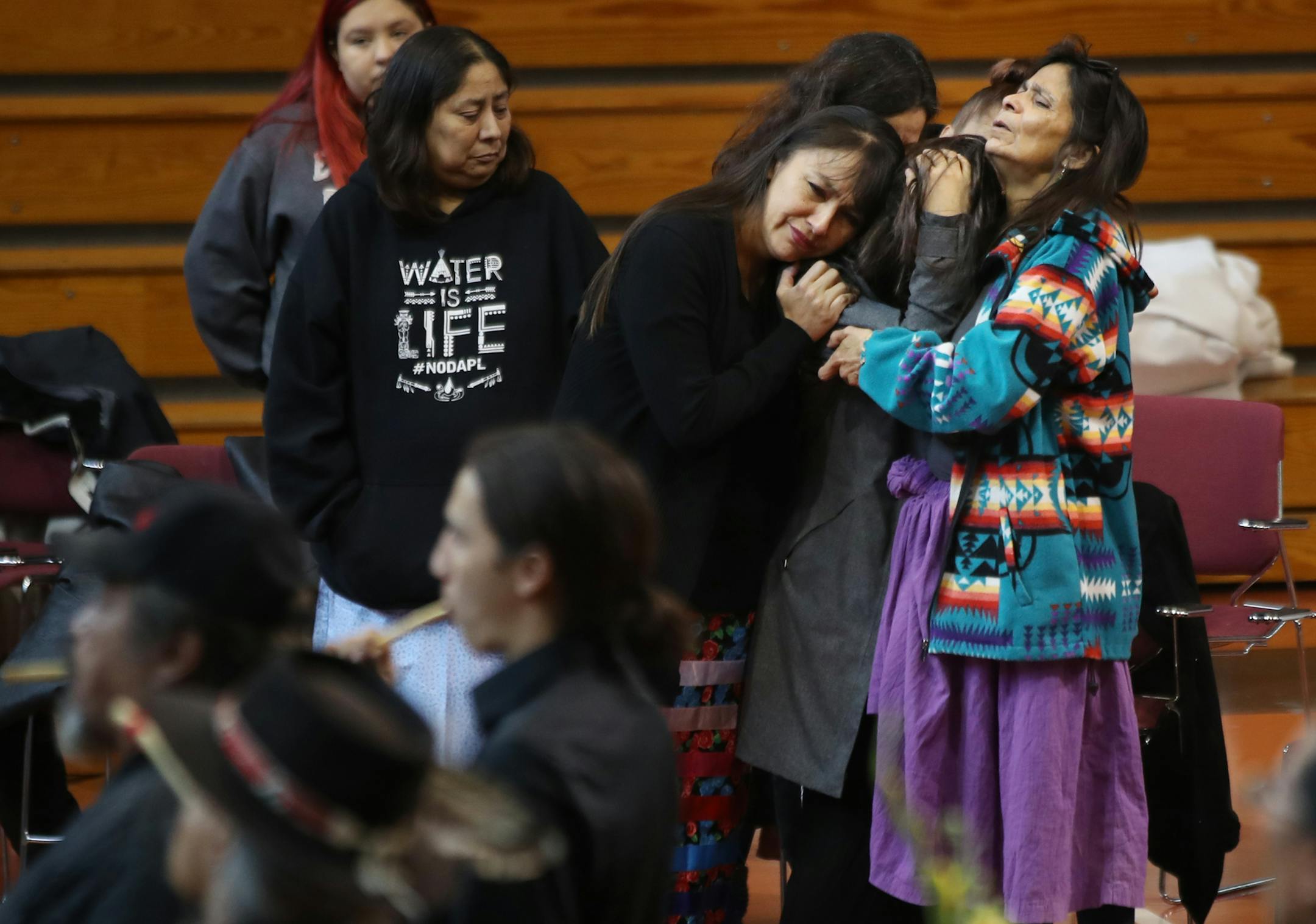 Family members consoled each other during an All-night visitation for AIM co-founder Dennis Banks at the American Indian Center, Wednesday November 1,2017 in Minneapolis, MN. ] JERRY HOLT &#xef; jerry.holt@startribune.com