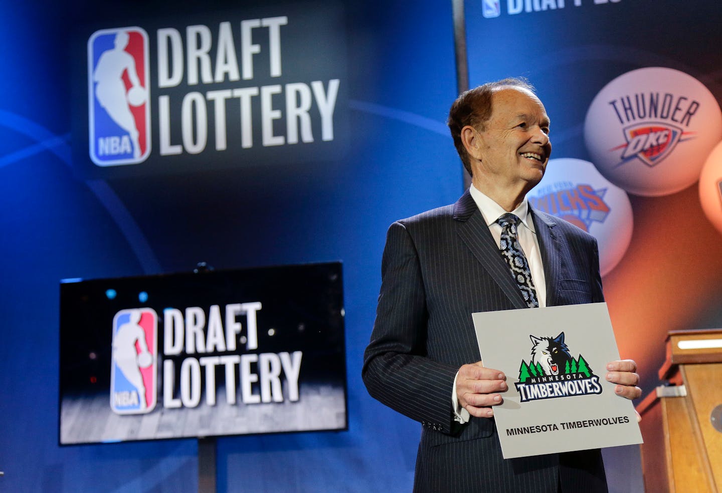 Minnesota Timberwolves owner Glen Taylor poses for photos after the Timberwolves won the No. 1 pick in the NBA basketball draft lottery Tuesday in New York.