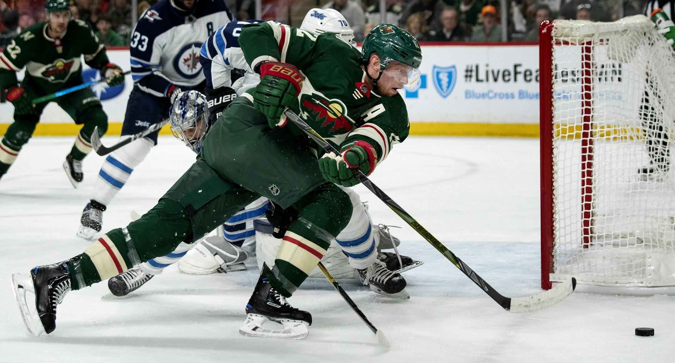 Eric Staal (12) chased the puck in the first period.