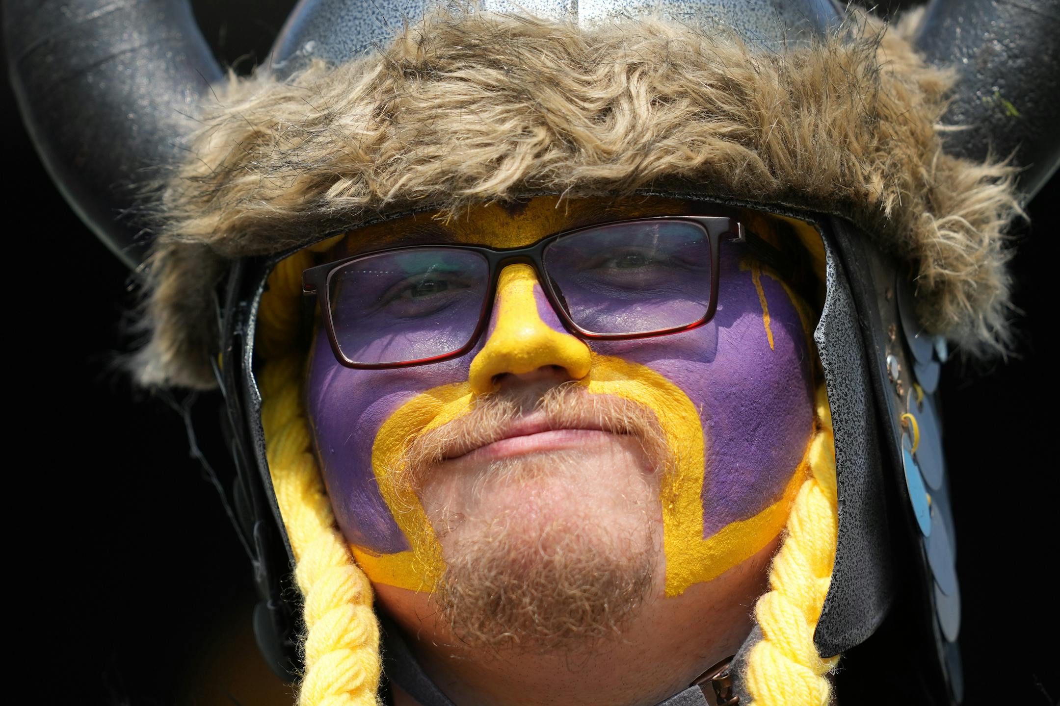 Tylor Saunders of Manchester, Ohio watched from the stands dressed in full Minnesota Vikings garb as he watch the team warm up on the field ahead the game against the Cincinnati Bengals