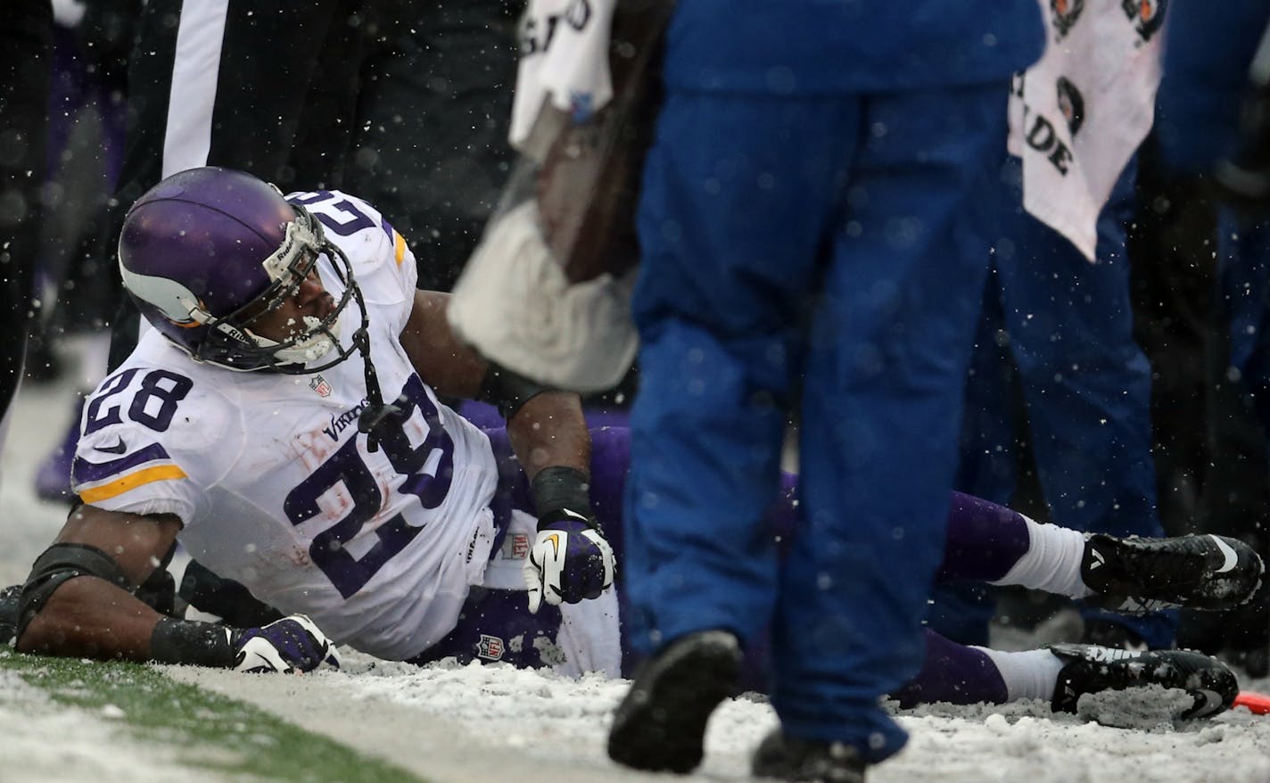 Vikings running back Adrian Peterson on the sideline after injuring his ankle in the second quarter.