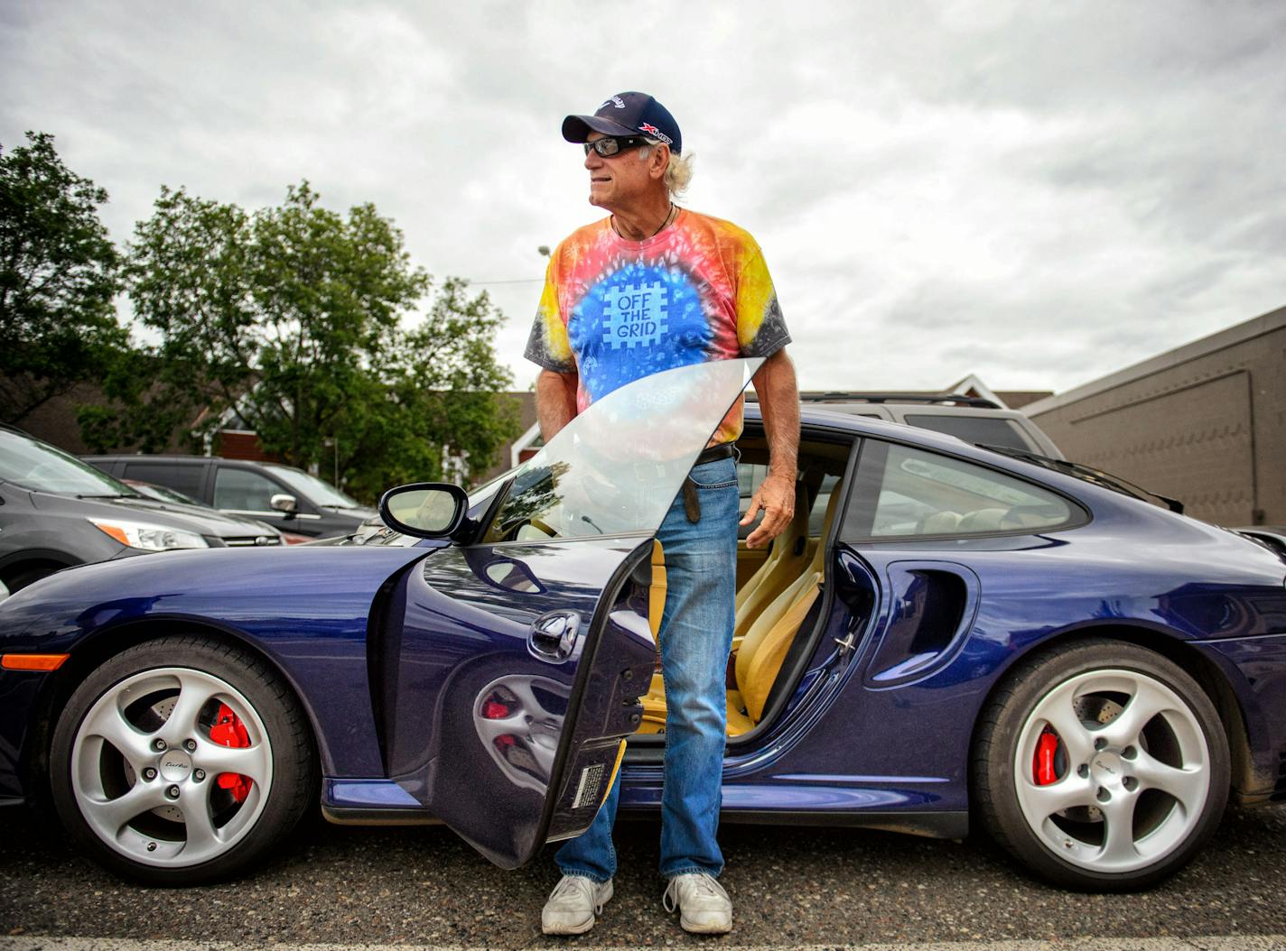 Former Minnesota Governor Jesse Ventura climbed into his 2003 Porsche Twin Turbo Carrera after an interview in Keys Cafe, White Bear Lake. ] GLEN STUBBE * gstubbe@startribune.com August 24, 2015