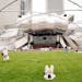 CHICAGO - JULY 16: Chicago residents and tourists explore the Pritzker Pavilion designed by famed architect Frank Gehry in the newly opened Millennium