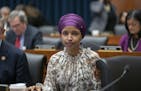 Rep. Ilhan Omar, D-Minn., sits with fellow Democrats on the House Education and Labor Committee during a bill markup, on Capitol Hill in Washington, W
