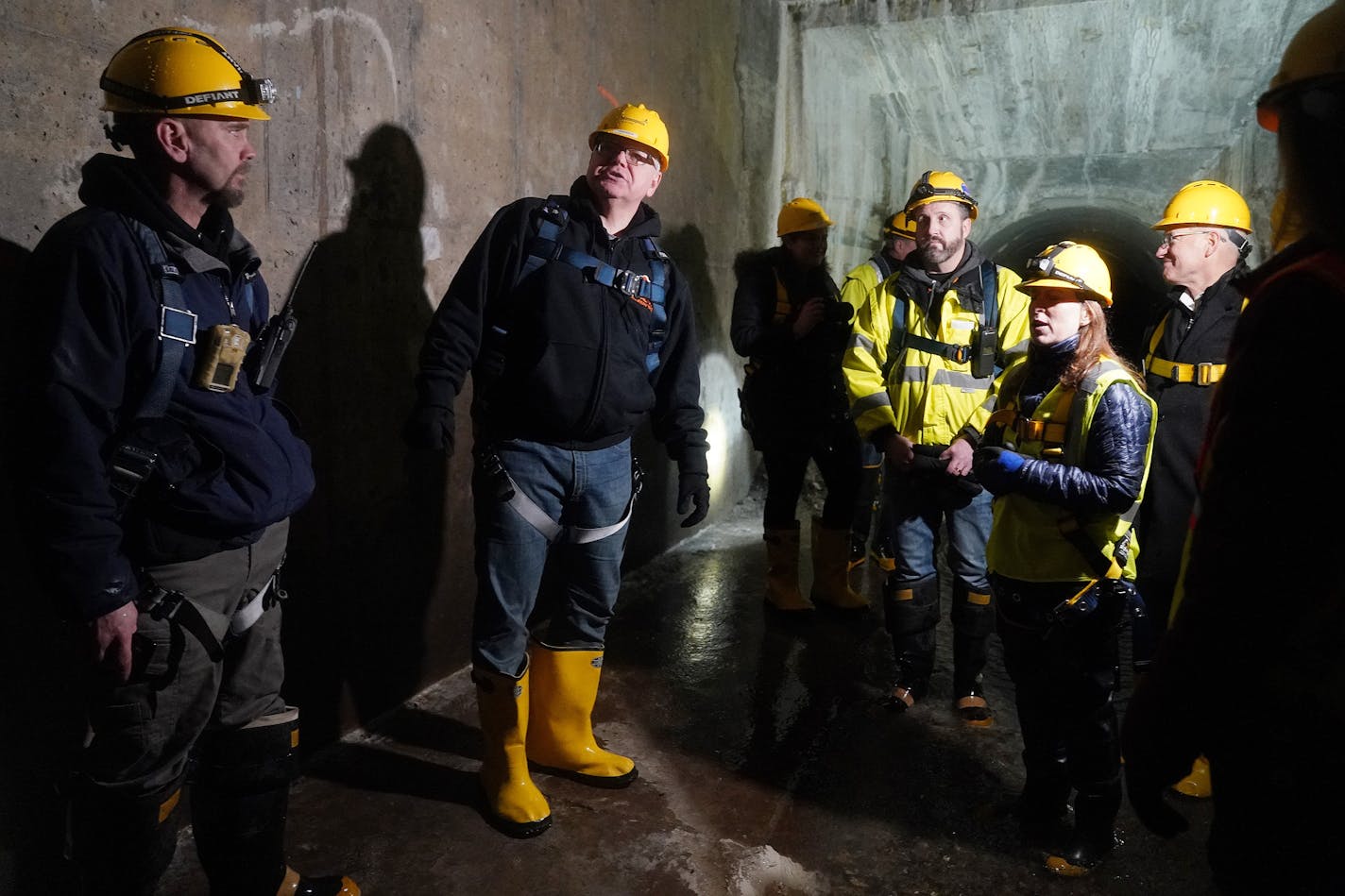 Gov. Tim Walz looked around a storm tunnel beneath the ground during a tour of the system in northeast Minneapolis Friday. ] ANTHONY SOUFFLE &#x2022; anthony.souffle@startribune.com Gov. Tim Walz and Myron Frans, commissioner of Minnesota Management and Budget, toured a municipal storm tunnel after he unveiled the second piece of his bonding package focusing on water quality Friday, Jan. 10, 2020 in northeast Minneapolis.