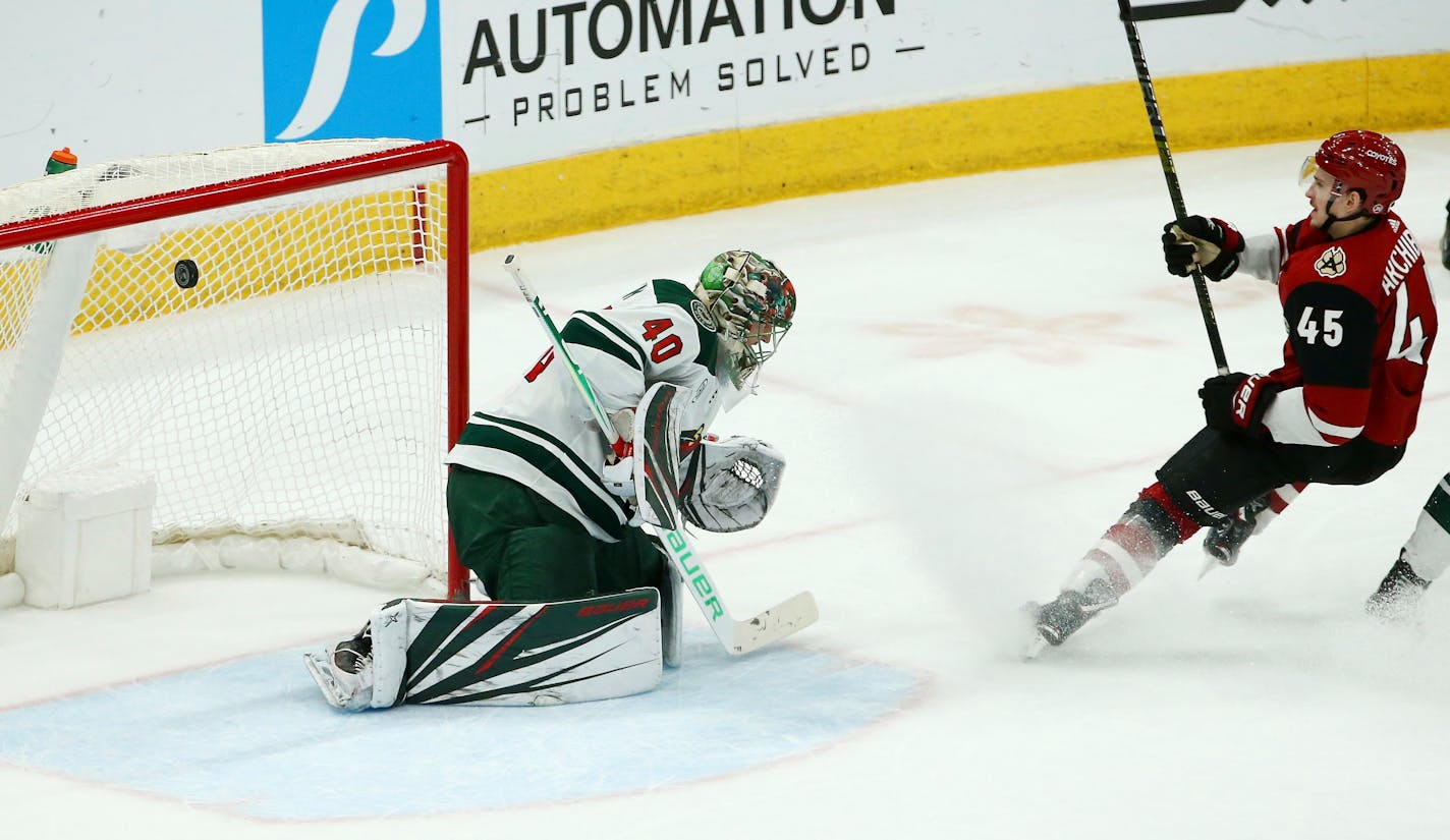 Arizona right wing Josh Archibald beats Wild goaltender Devan Dubnyk for a goal during the second period