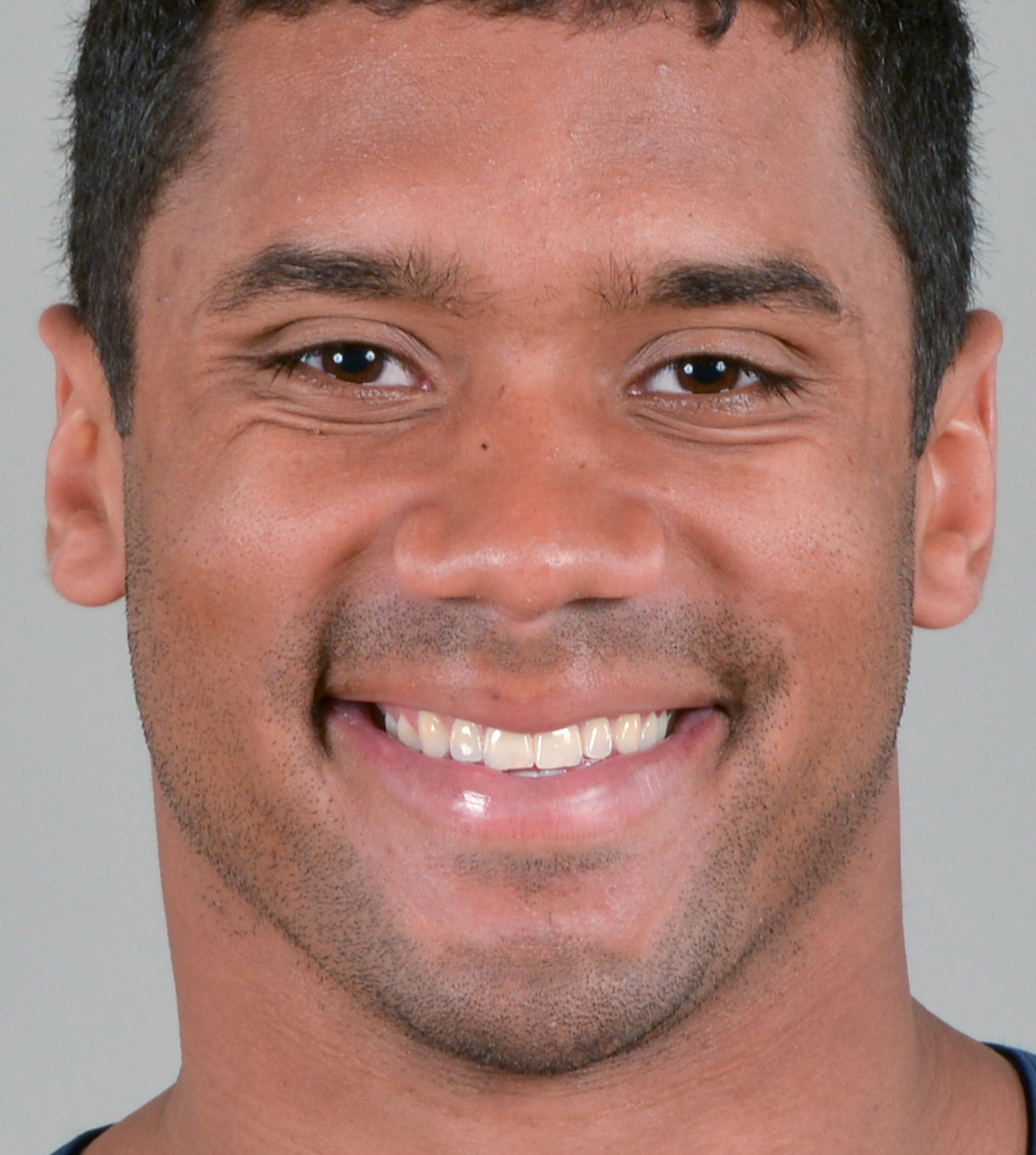 This is a 2013 photo of Russell Wilson of the Seattle Seahawks NFL football team. This image reflects the Seattle Seahawks active roster as of Wednesday, May 29, 2013 when this image was taken. (AP Photo) ORG XMIT: NFLHS13