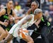 Lynx guard Courtney Williams drives against Storm forward Nneka Ogwumike during the fourth quarter of Tuesday night's WNBA opener in Seattle.