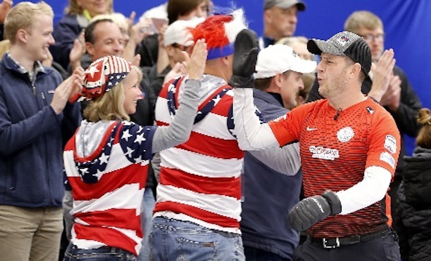 John Shuster, who skipped the U.S. curling team to Olympic gold, got high-fives last week before taping "Curling Night in America."