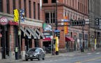 Bars on 1st Avenue in downtown Minneapolis that would normally be busy during happy hour on St. Patrick's Day were quiet on Tuesday after a state orde