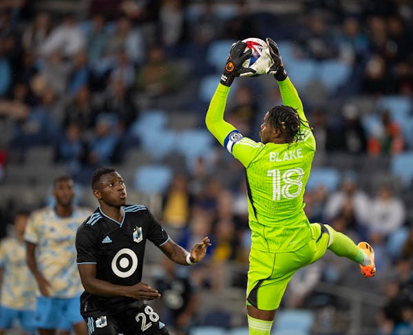 Philadelphia Union goalkeeper Andre Blake grabbed an incoming ball in front of Minnesota United forward Mender García in the first half. Minnesota Un