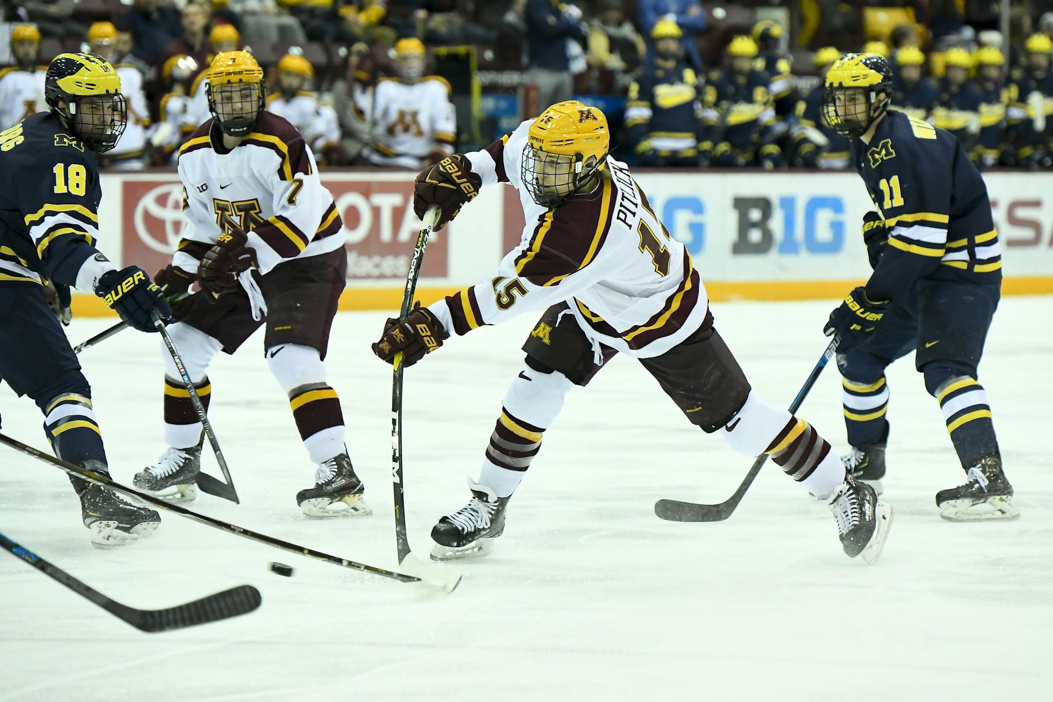 Minnesota Golden Gophers forward Rem Pitlick (15) attempted a shot in the second period against the Michigan Wolverines.