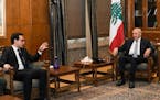 French Foreign Minister Stephane Sejourne, left, speaks with Parliament Speaker Nabih Berri during their meeting in Beirut, Lebanon, Sunday, April 28,