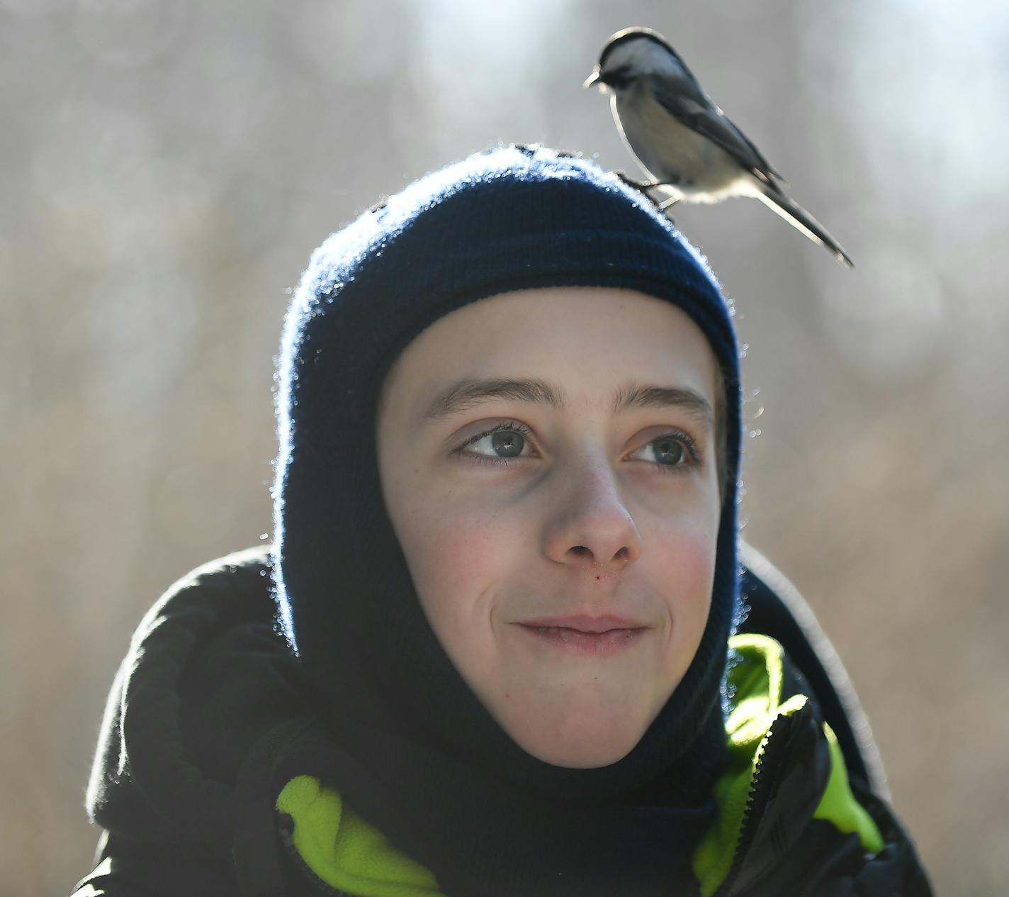 A chickadee landed on the head of Bethlehem Academy student Matthew Croke during a birding class Tuesday at the Wolf Ridge Environmental Learning Center in Finland. ] AARON LAVINSKY &#xef; aaron.lavinsky@startribune.com The Wolf Ridge Environmental Learning Center was looking to expand and eyeing a gorgeous plot of land on Lake Superior the DNR was selling. An Edina couple outbid them and then turned around gave the wolf center a long-term lease. The new land is 5 miles from the main campus. We