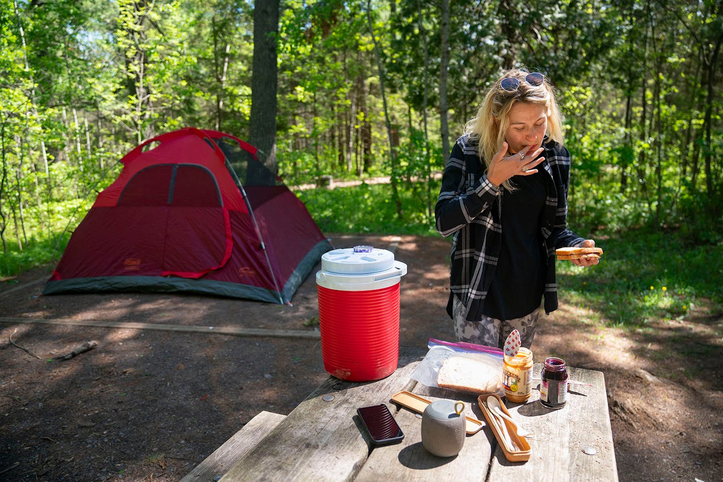 Meghan Wellner made herself a sandwich as she set up camp.