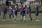 United States players warm up during soccer training camp on Jan. 7 in Chula Vista, Calif.