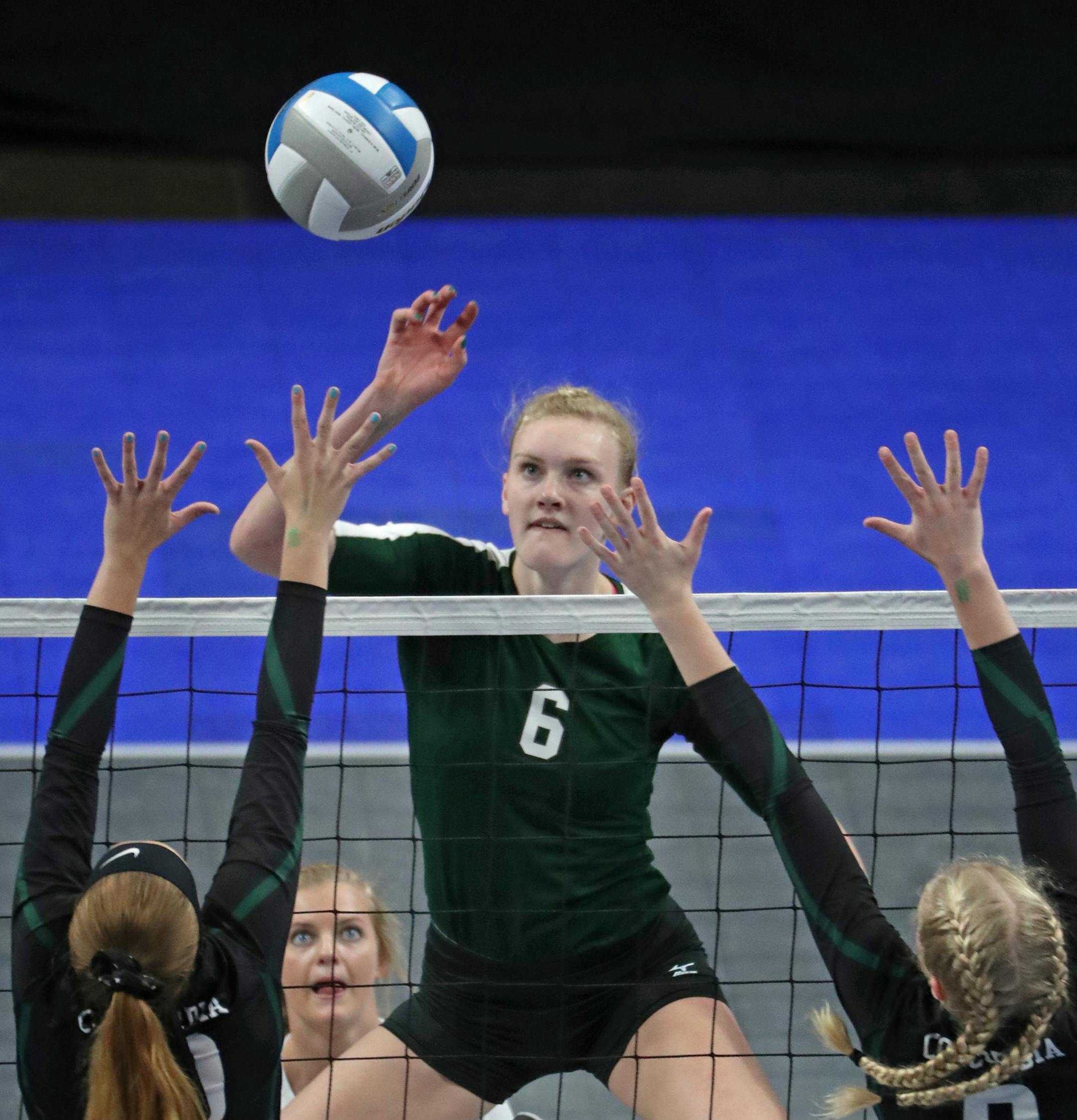 Maple Lake's Brynn Paumen attempted to get the ball past Concordia Academy.] Maple Lake defeated Concorida Academy in the finals match of the state high school class 2A volleyball tournament on Saturday, November 12, 2016 at the Xcel Energy Center in St. Paul, Minn.