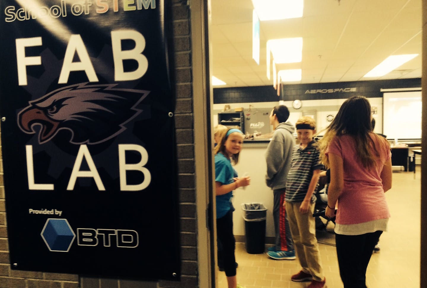 Photo by Erin Adler. Students at Valley Middle School stand inside their new fab lab.