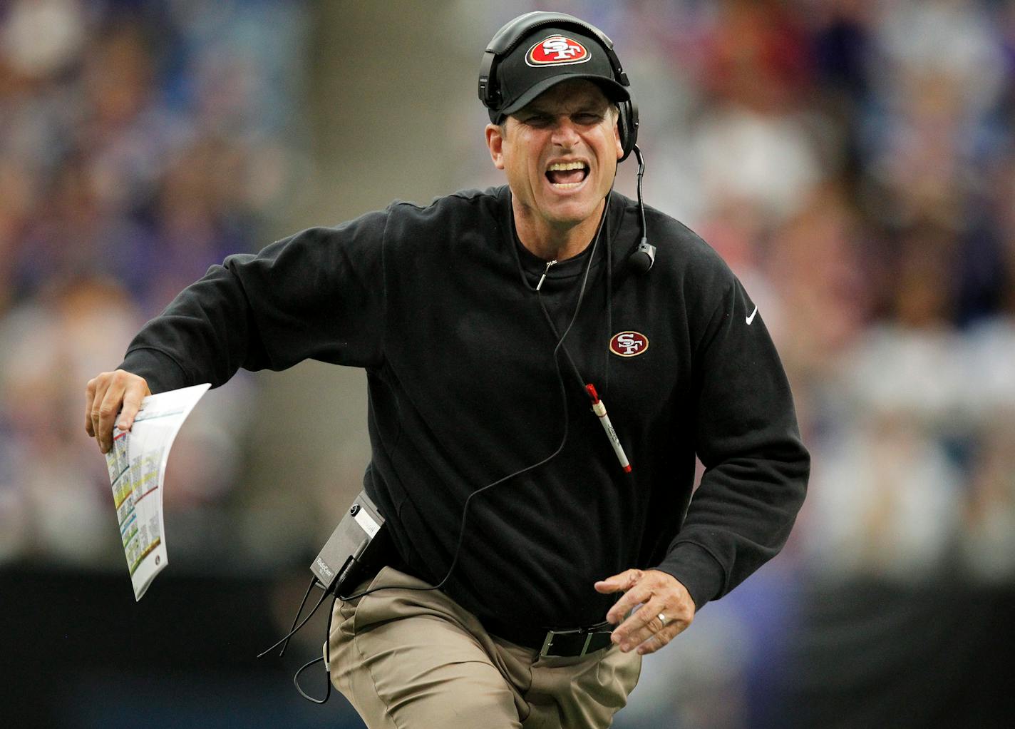 49ers head coach Jim Harbaugh yelled at a referee questioning the spot of the ball in the fourth quarter. ] CARLOS GONZALEZ cgonzalez@startribune.com - September 23, 2012 , Minneapolis, Minn, Mall of America Field, The Metrodome, NFL, Minnesota Vikings vs. San Francisco 49ers ORG XMIT: MIN1209231556350109