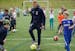 Soccer player Fabian Lustenberger member of the Berlin Hertha team from Germany&#xd5;s Bundesliga helped students at Twin Cities German language immer