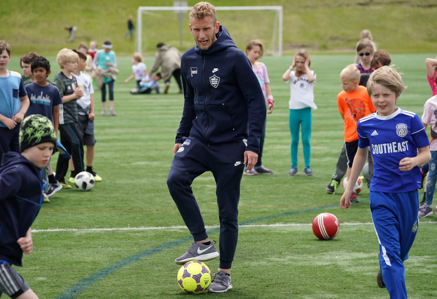 Soccer player Fabian Lustenberger member of the Berlin Hertha team from Germany&#xd5;s Bundesliga helped students at Twin Cities German language immersion school with soccer tips. )
brian.peterson@startribune.com
St. Paul, MN Tuesday, May 21, 2019