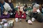 FILE - In this Feb. 15, 1992 file photo, Andrew Dodwell listen as left, as Democratic presidential candidate, Arkansas Gov. Bill Clinton, accompanied 