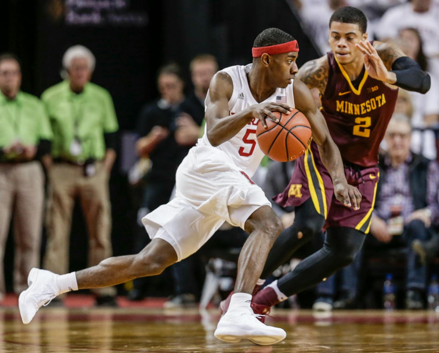 Nebraska's Glynn Watson Jr. (5) drives past Minnesota's Nate Mason (2) during the second half of an NCAA college basketball game in Lincoln, Neb., Tuesday, Dec. 5, 2017. Nebraska won 78-68.