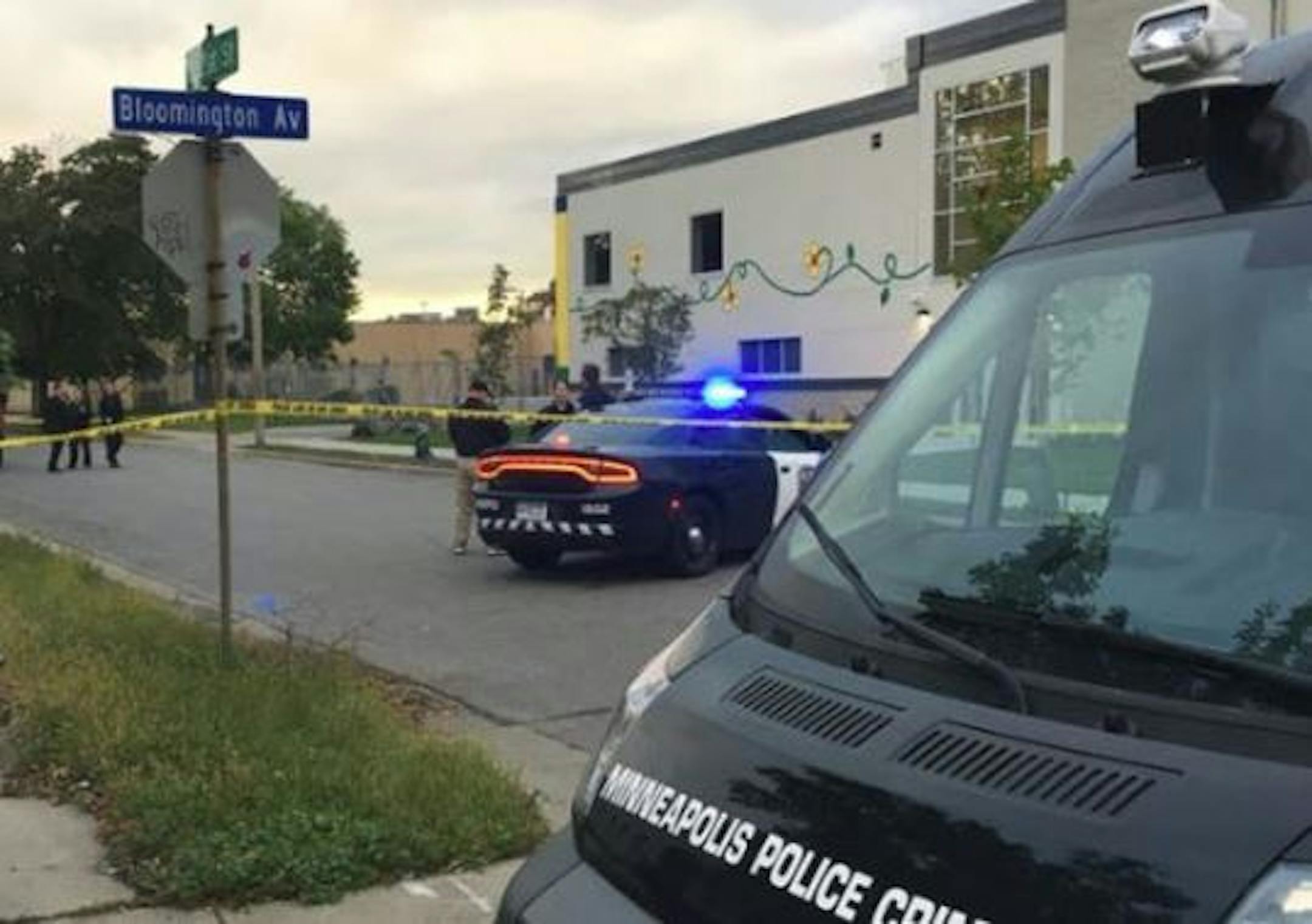 Police collected evidence at a homicide scene Tuesday in Minneapolis.