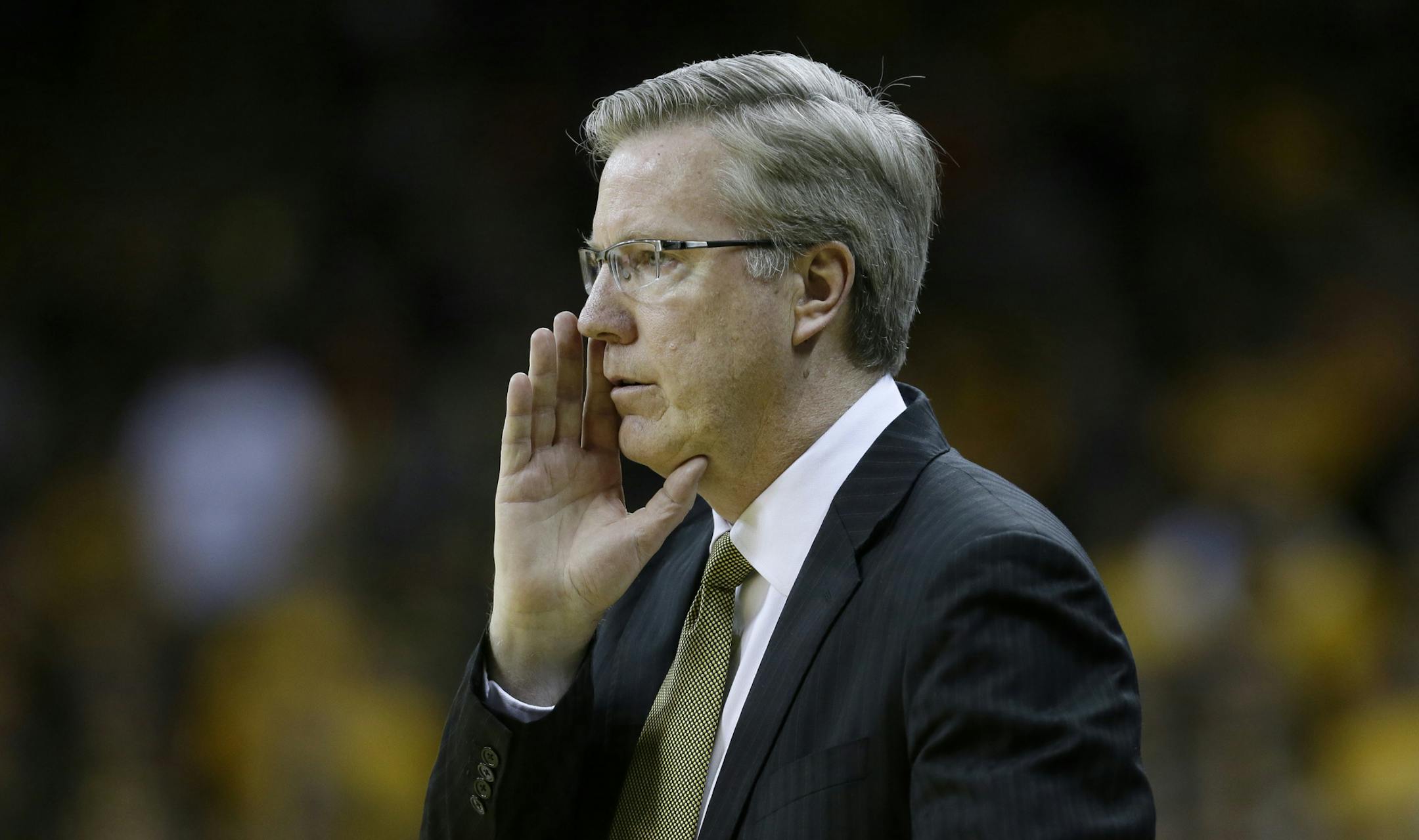 Iowa head coach Fran McCaffery shouts to his team during the second half of an NCAA college basketball game against Illinois, Saturday, March 8, 2014, in Iowa City, Iowa. Illinois won 66-63. (AP Photo/Charlie Neibergall)