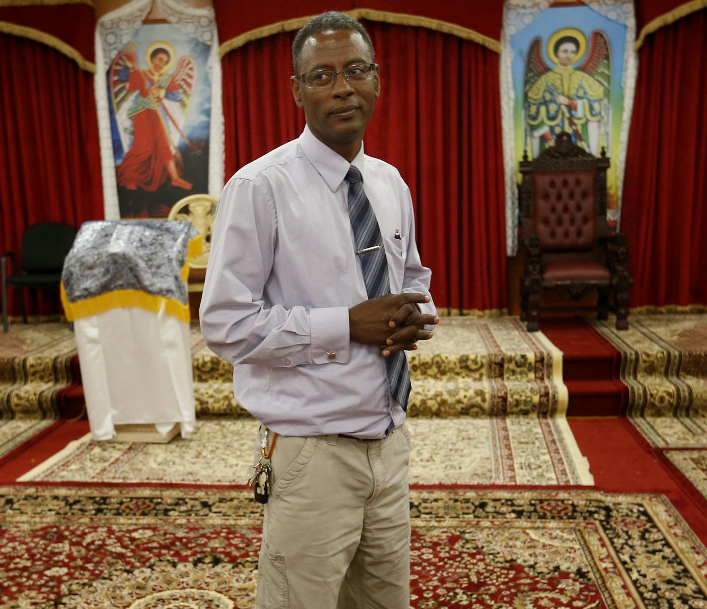 Demissie Kebede gave a tour of the Ethiopian Orthodox Tewahedo Church in Minneapolis. A building that once housed an IT supplier on Minnehaha Avenue has been purchased by an Ethiopian group and transformed into a church. ] CARLOS GONZALEZ cgonzalez@startribune.com - August 26, 2015, Minneapolis, MN, A building that once housed an IT supplier on Minnahaha Avenue has been purchased by an Ethiopian group and transformed into a Christian church. Ethiopian Orthodox Tewahedo