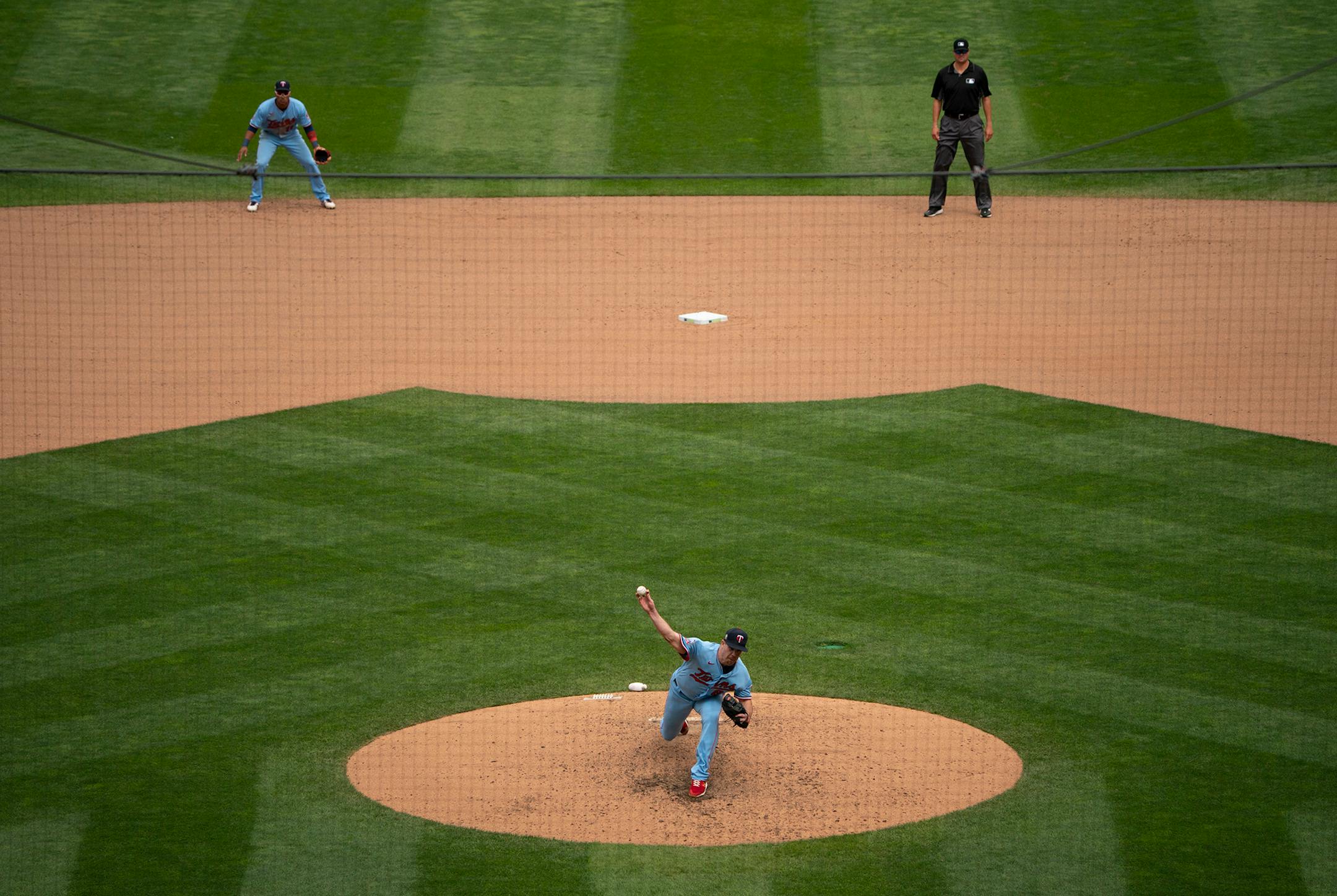 Minnesota Twins relief pitcher Trevor May (65) throwing against Cleveland in the eighth inning.