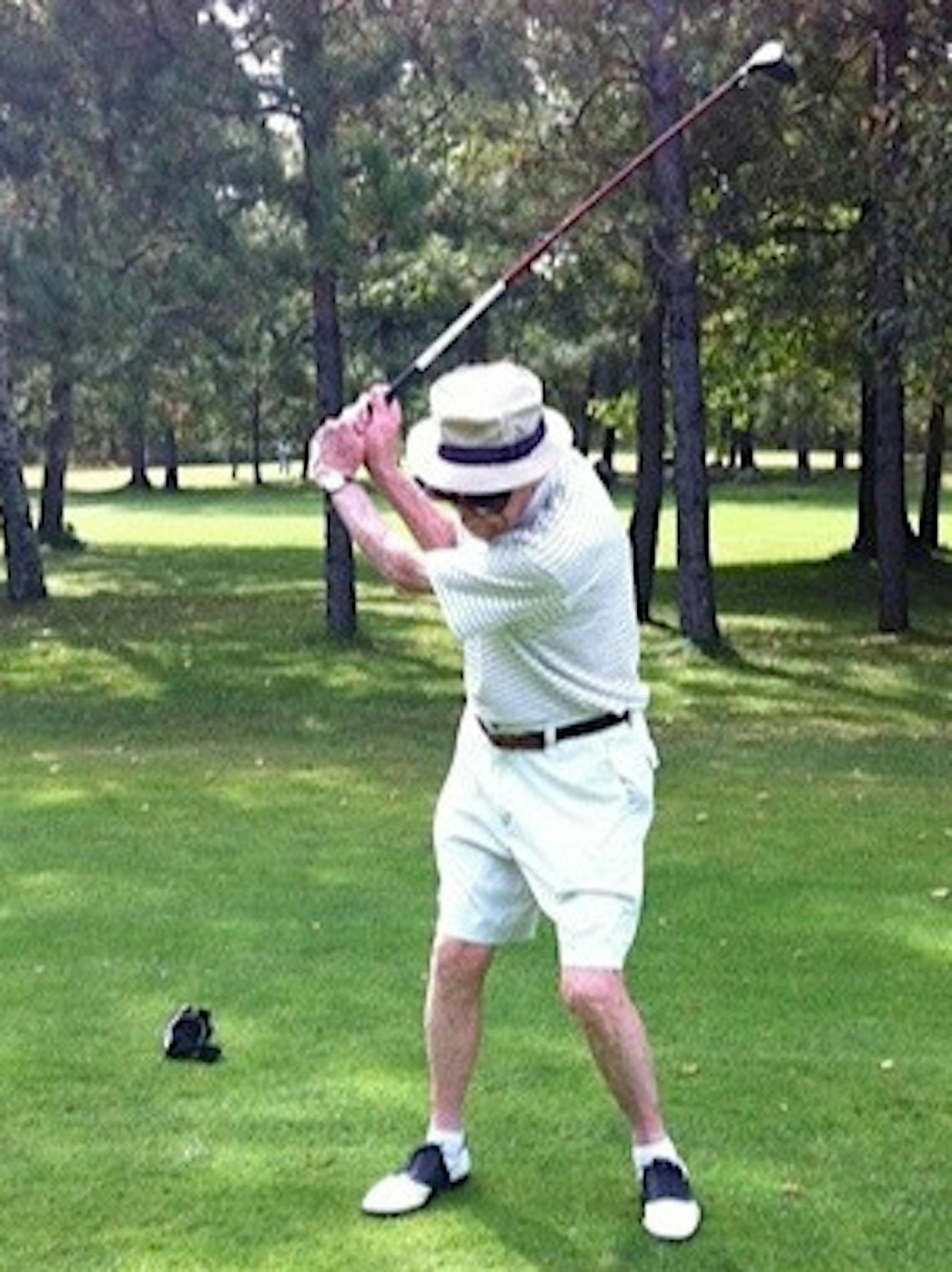 His golf swing was strong and fluid after 80 years of practice.