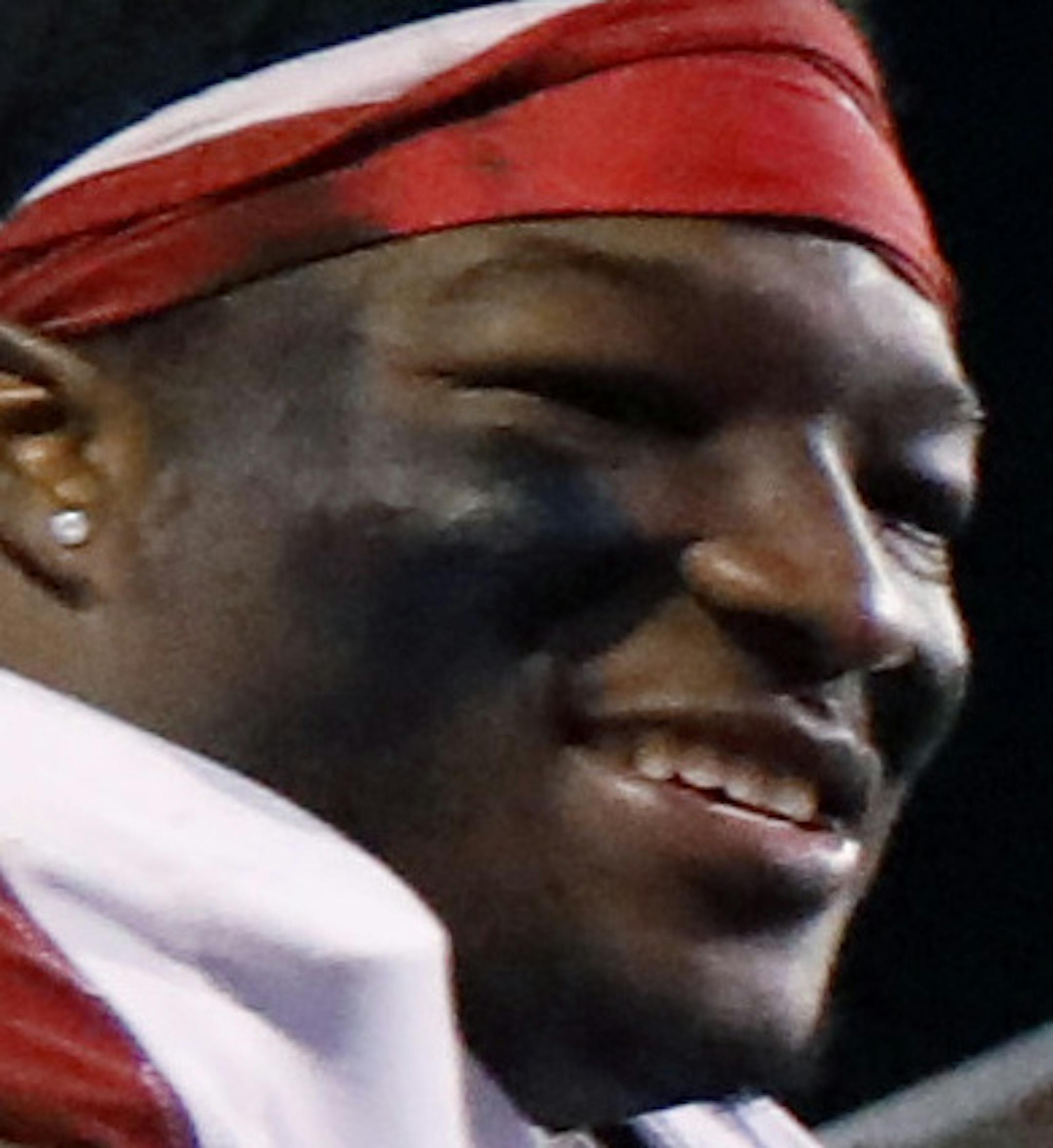 Arkansas running back Rawleigh Williams III (22) fists bumps with head coach Bret Bielema following their 58-42 win in their NCAA college football game against Mississippi State in Starkville, Miss., Saturday, Nov. 19, 2016. (AP Photo/Rogelio V. Solis) ORG XMIT: MSRS123