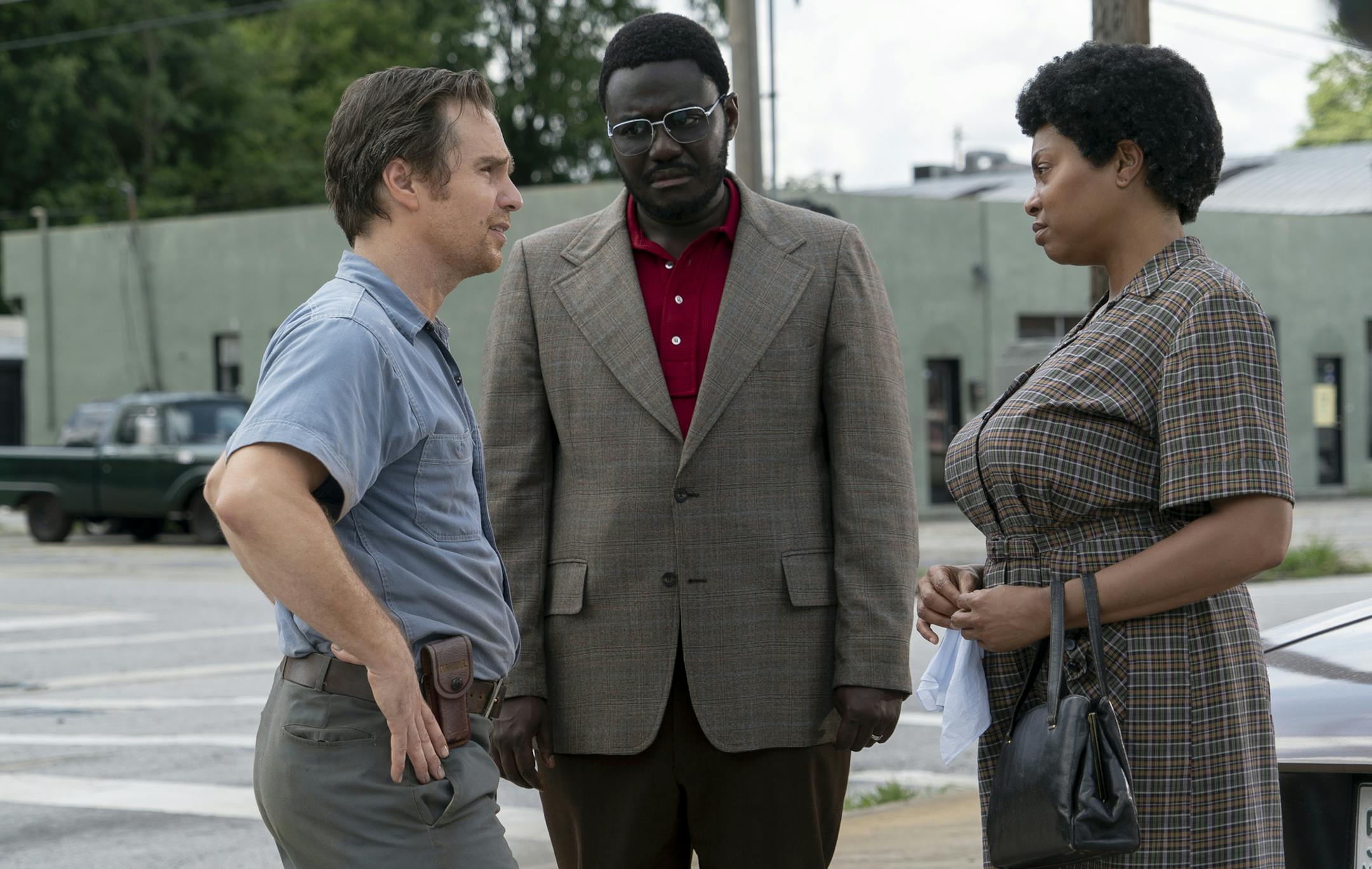 This image released by STXfilms shows, from left, Sam Rockwell, Babou Ceesay and Taraji P. Henson in a scene from "The Best of Enemies." (Annette Brown/STXfilms via AP)