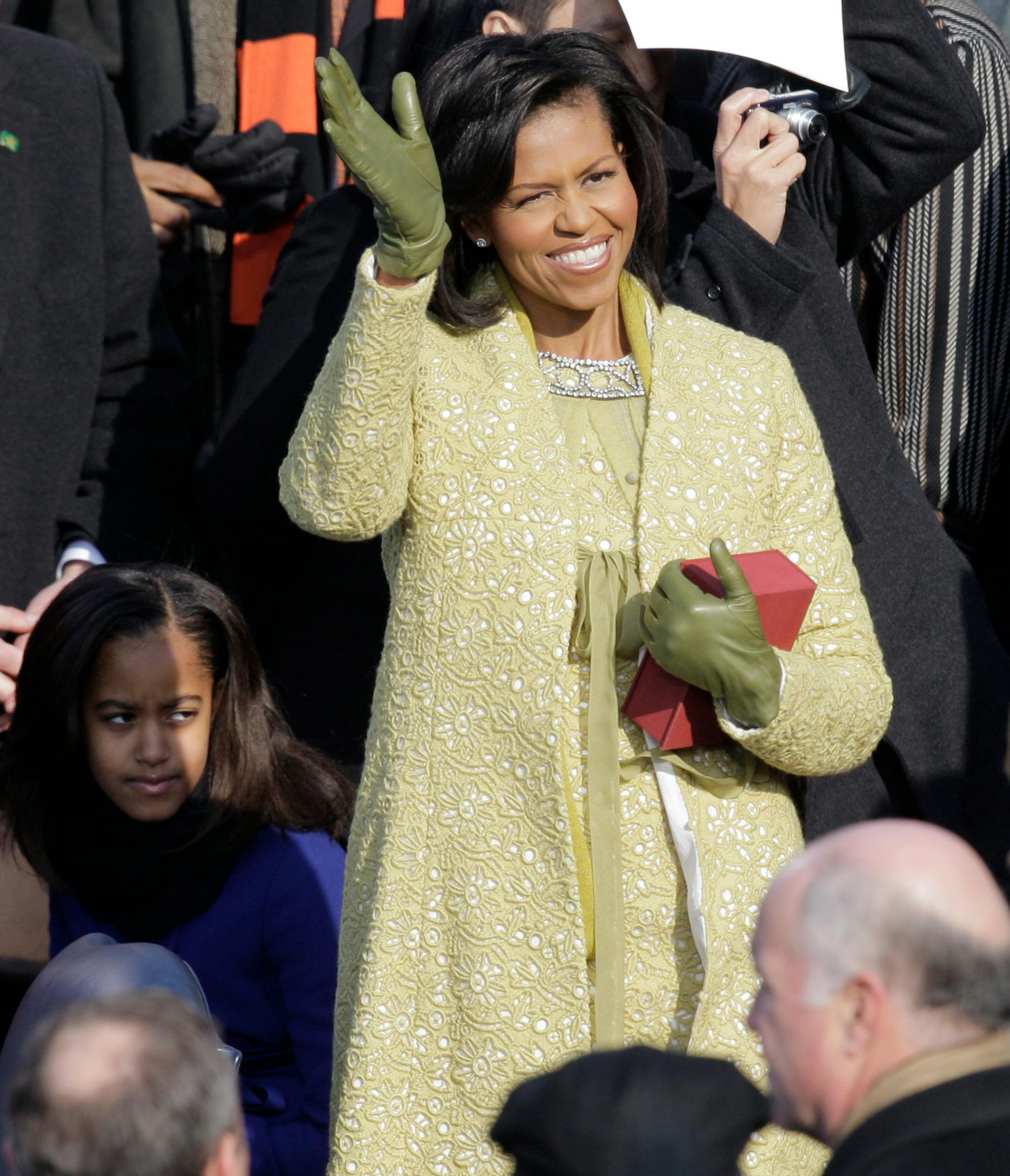 This Jan. 20, 2009 file photo shows Michelle Obama as she arrives for the inauguration ceremony at the U.S. Capitol in Washington. The color of Michelle Obama's Isabel Toledo ensemble appeared to shift and change all day Tuesday, leading some observers wondering what to call the shade.