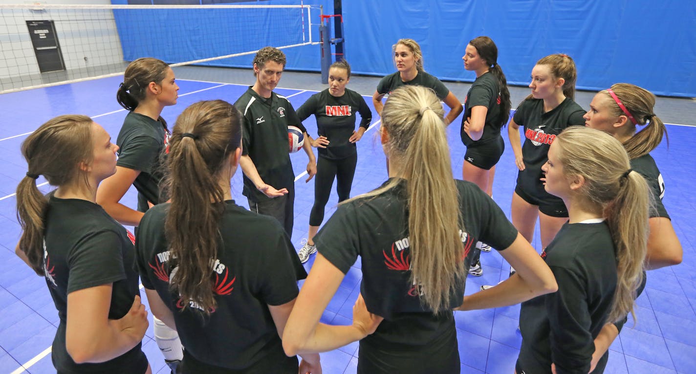 (center) Northern Lights 18-1 Head Coach Adam Beamer talked to his team at the end of practice on 6/19/13. Summer all-zone feature on the Northern Lights volleyball, top team of elite high school players. PThe team will lleave later in the week for a big tournament. Jim Paulsen is the reporter, can provide more details. Story will take up the zone cover in three zones, so looking for main display and secondary shots. The reason they&#x201a;&#xc4;&#xf4;re so good is because of how well they get a