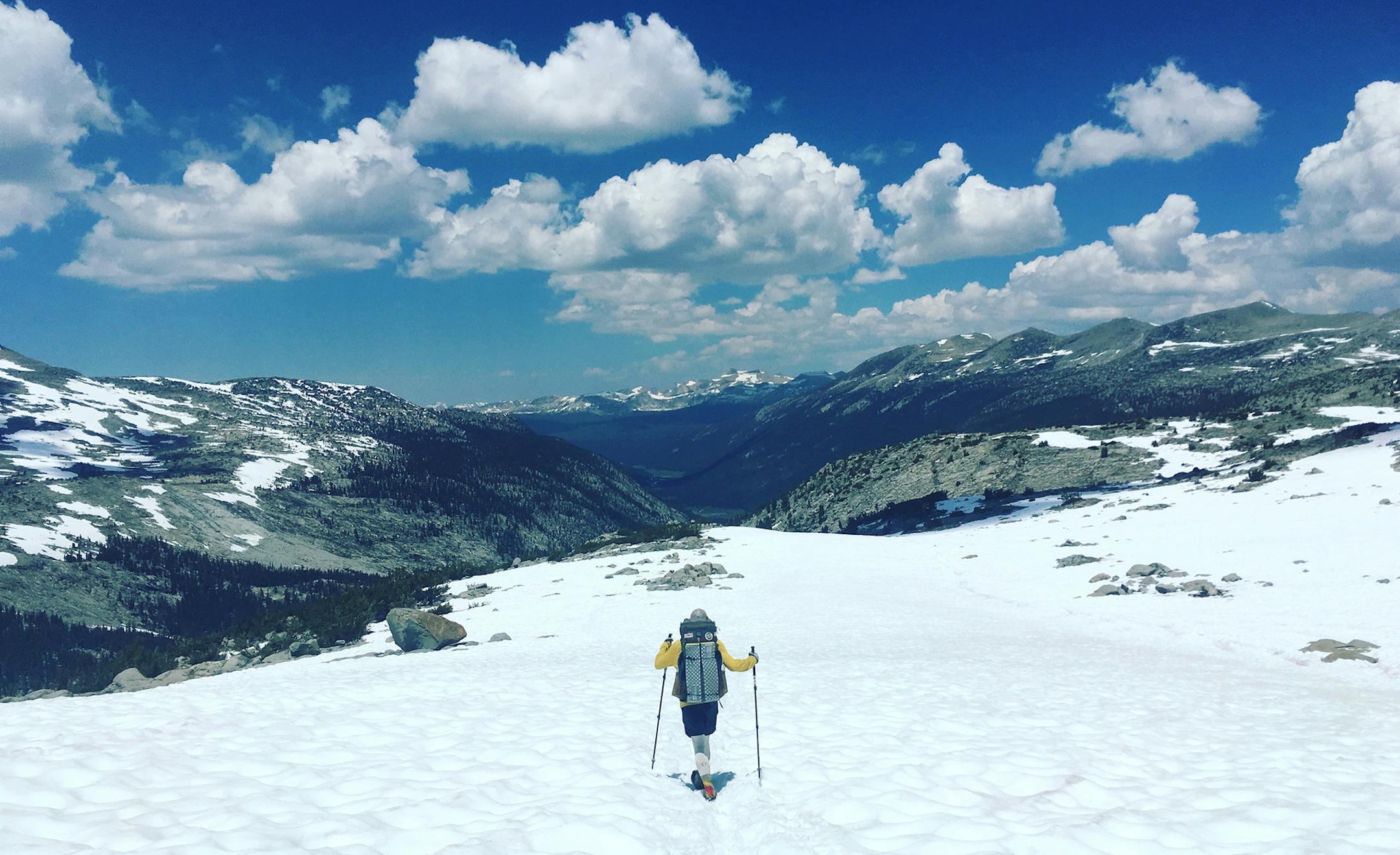 Descending Donahue Pass from the John Muir Wilderness into Yosemite NP. 200% the normal snowfall made navigating the Sierras in 2017 a new kind of challenge for thru-hikers.