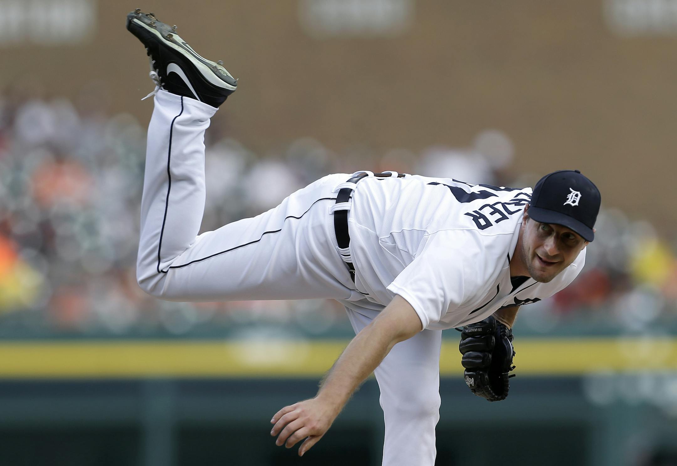 Detroit Tigers pitcher Max Scherzer throws against the Baltimore Orioles in the first inning of a baseball game in Detroit, Monday, June 17, 2013. (AP Photo/Paul Sancya)