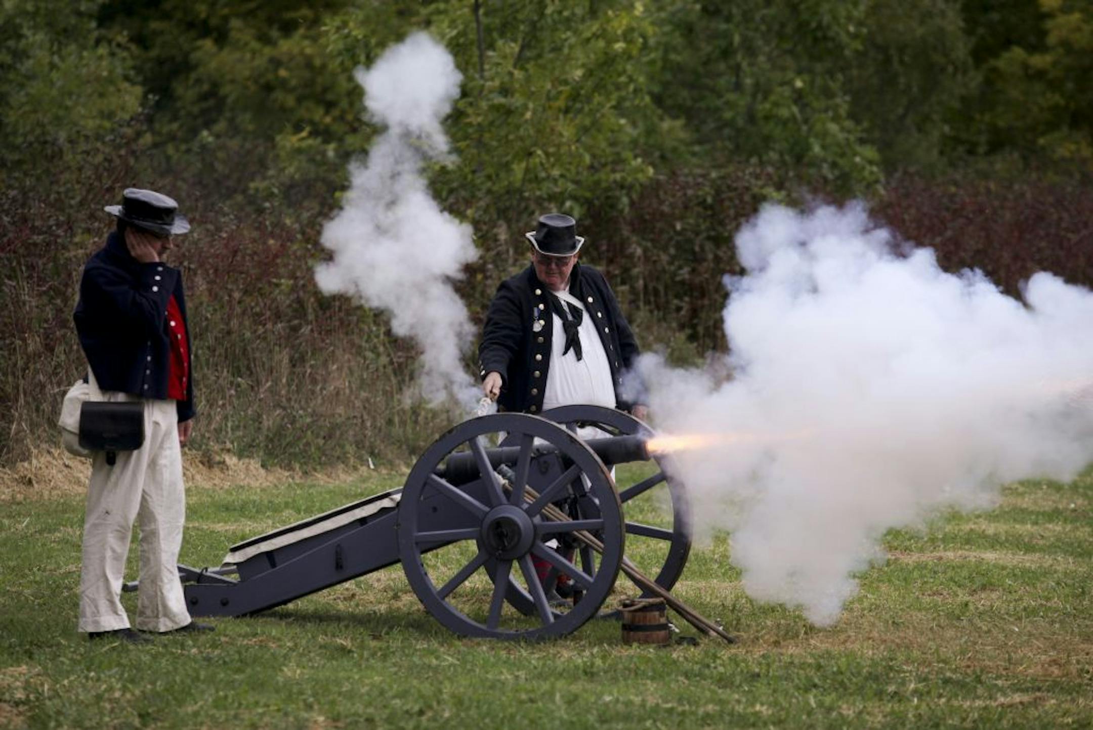 Part of Canada's bicentennial activities include re-enactors of the War of 1812, including these at the Glengarry Pioneer Museum.