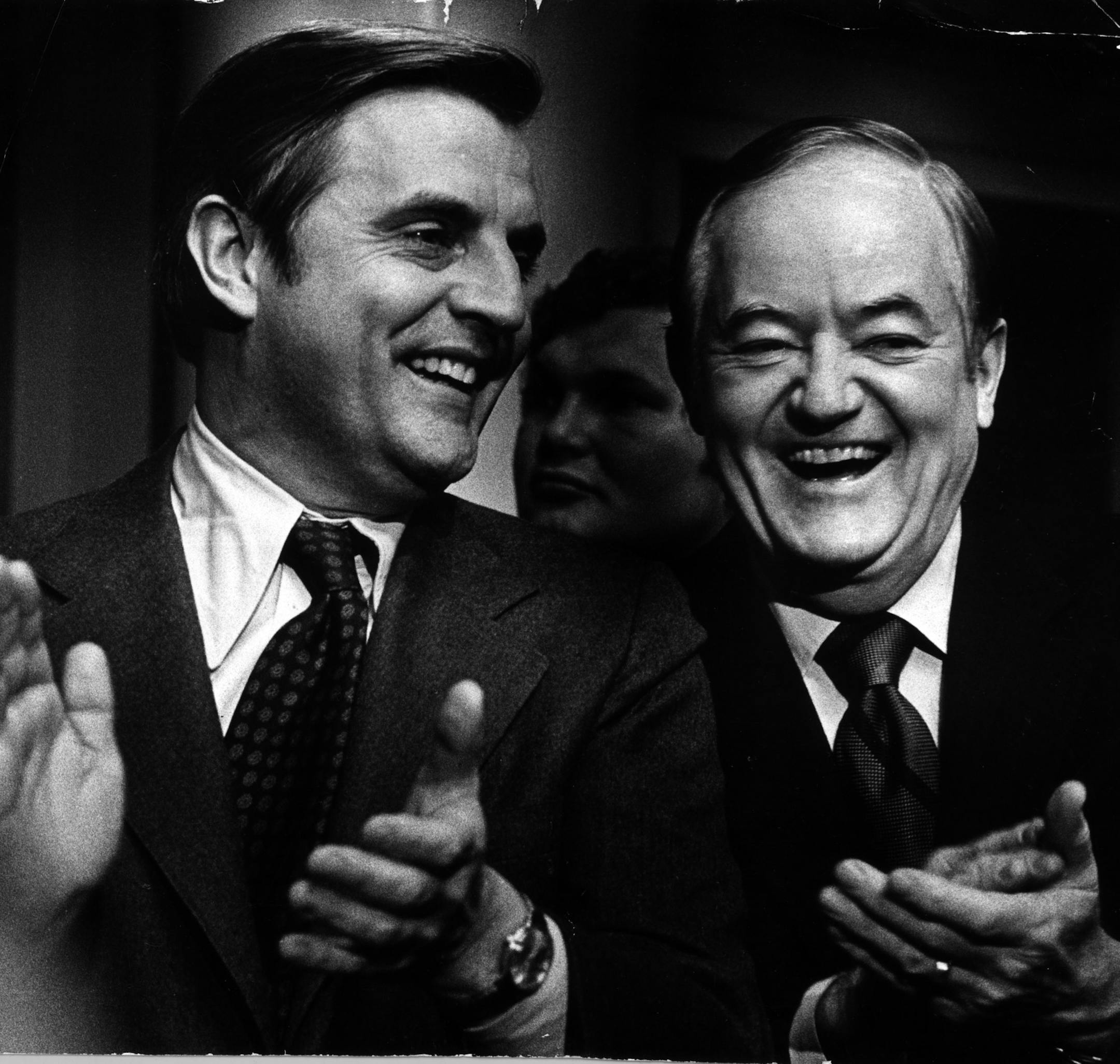 Sens. Walter Mondale (at left) and Hubert Humphrey applaud a fellow DFLer, Minnesota Gov. Wendell Anderson, during Anderson's inaugural message. Minneapolis Tribune photo Wednesday January 8, 1975, by Kent Kobersteen. ORG XMIT: MIN2017060710030433