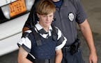 FILE -- In this June 18, 2015 file photo, Charleston, S.C., shooting suspect Dylann Storm Roof is escorted from the Cleveland County Courthouse in She