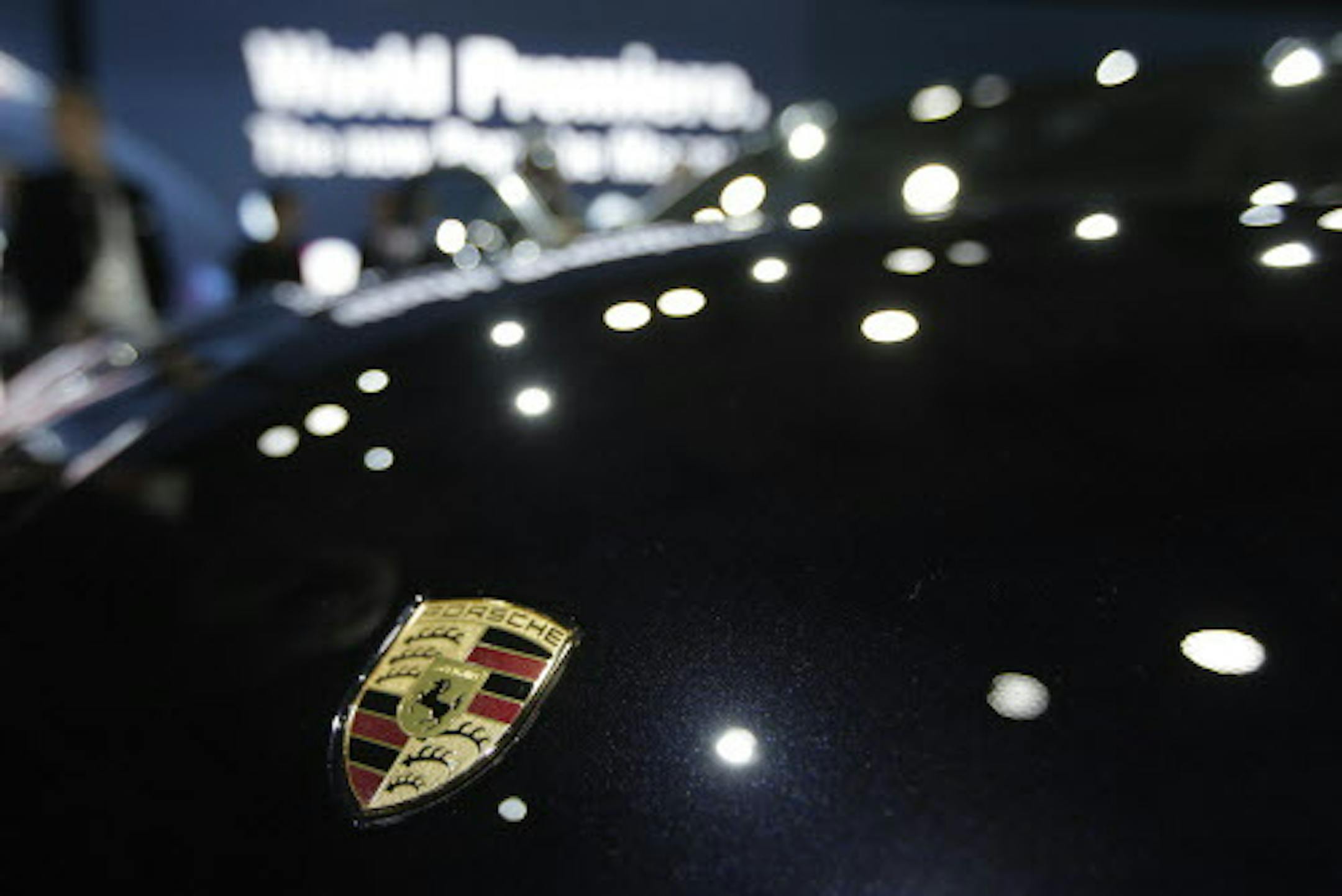 The new Porsche Macan Turbo is introduced at the Los Angeles Auto Show in Los Angeles, Tuesday, Nov. 19, 2013. (AP Photo/Chris Carlson)